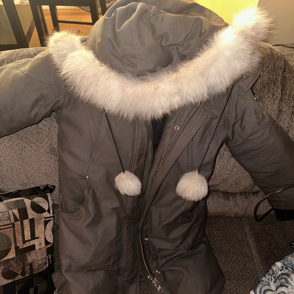 moose knuckle parka with white fur size small.